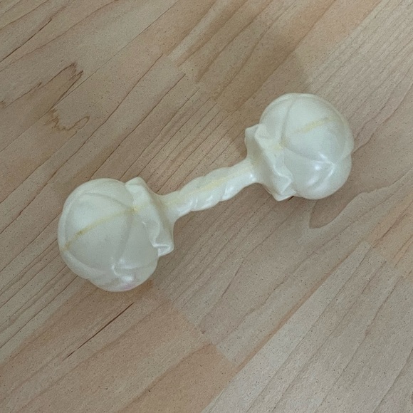 Vintage white plastic rattle